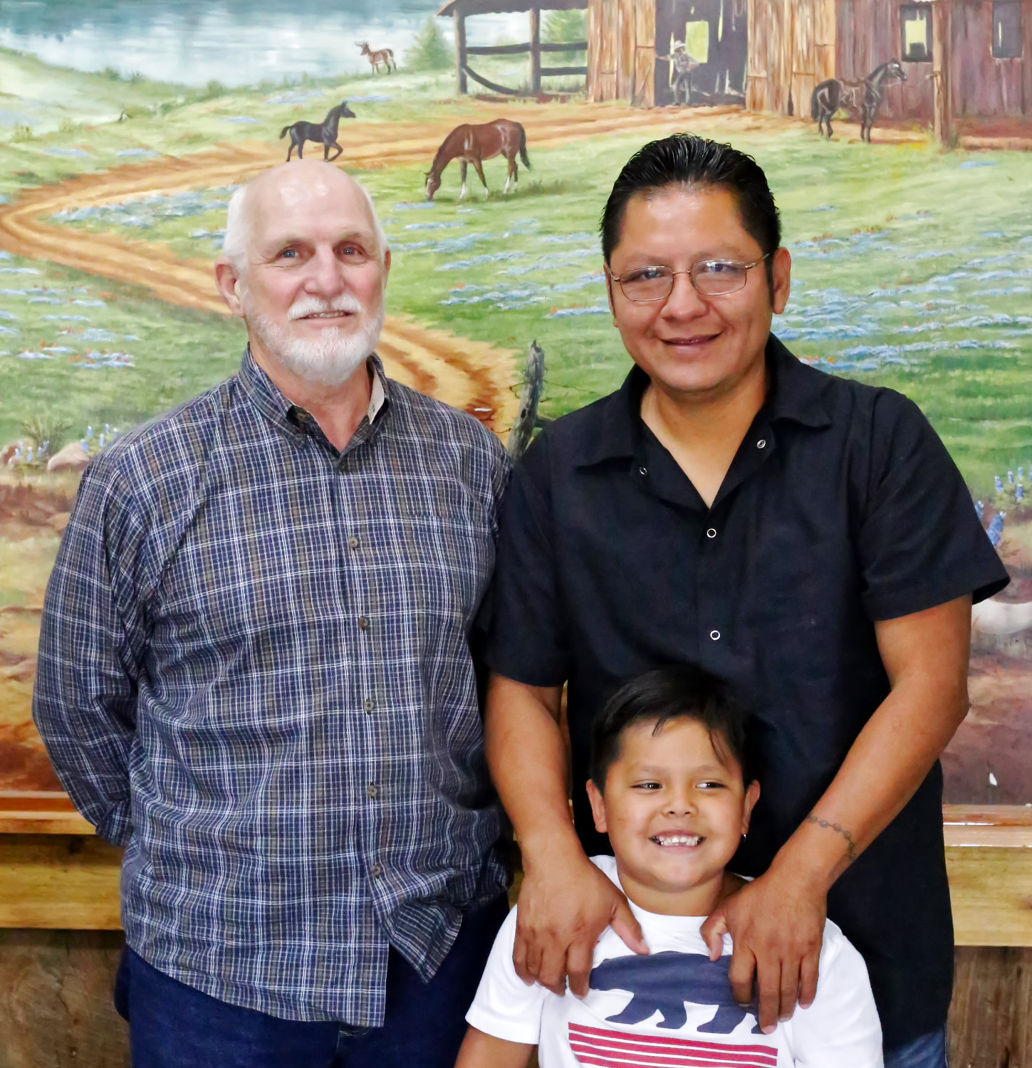 Business partners Ira T. Price and Ricky Perez are joined by Perez’s youngest son, Raeden, at the site of the new Richie’s Grill north of Hawkins.